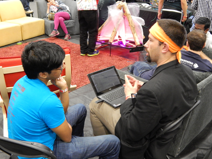 Bitcamp 2016: Corey Sheldon (linuxmodder) helps a student install Fedora