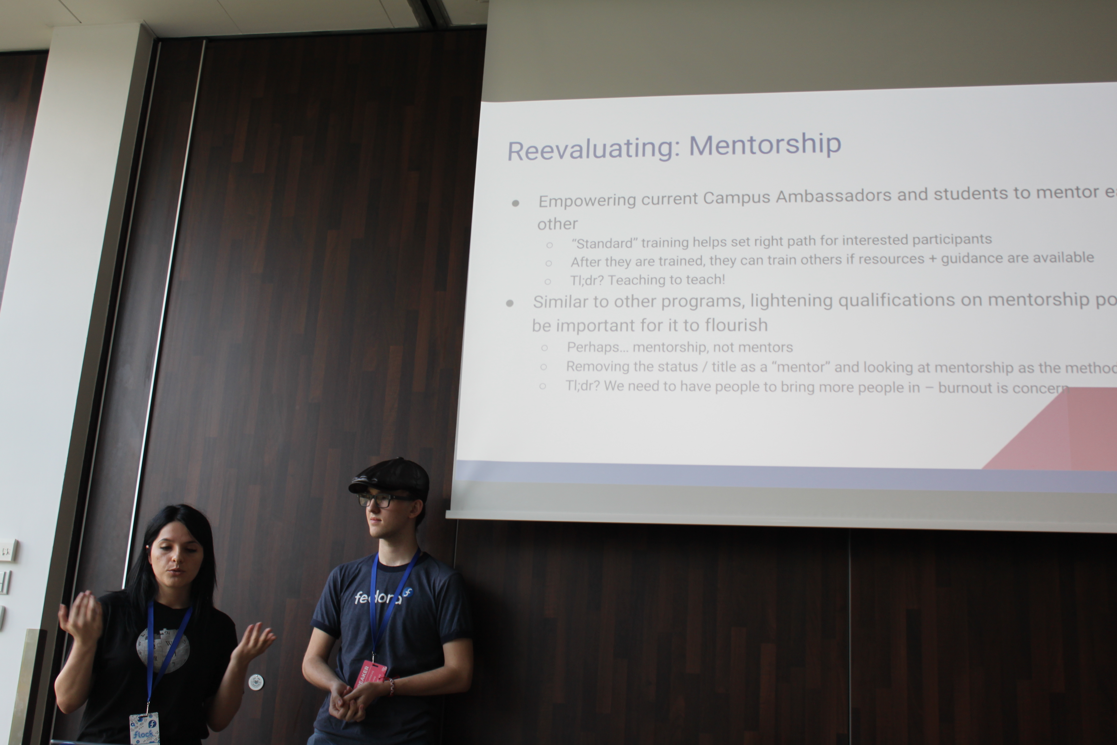 Me and Jona during our presentation on University Outreach at Fedora Flock