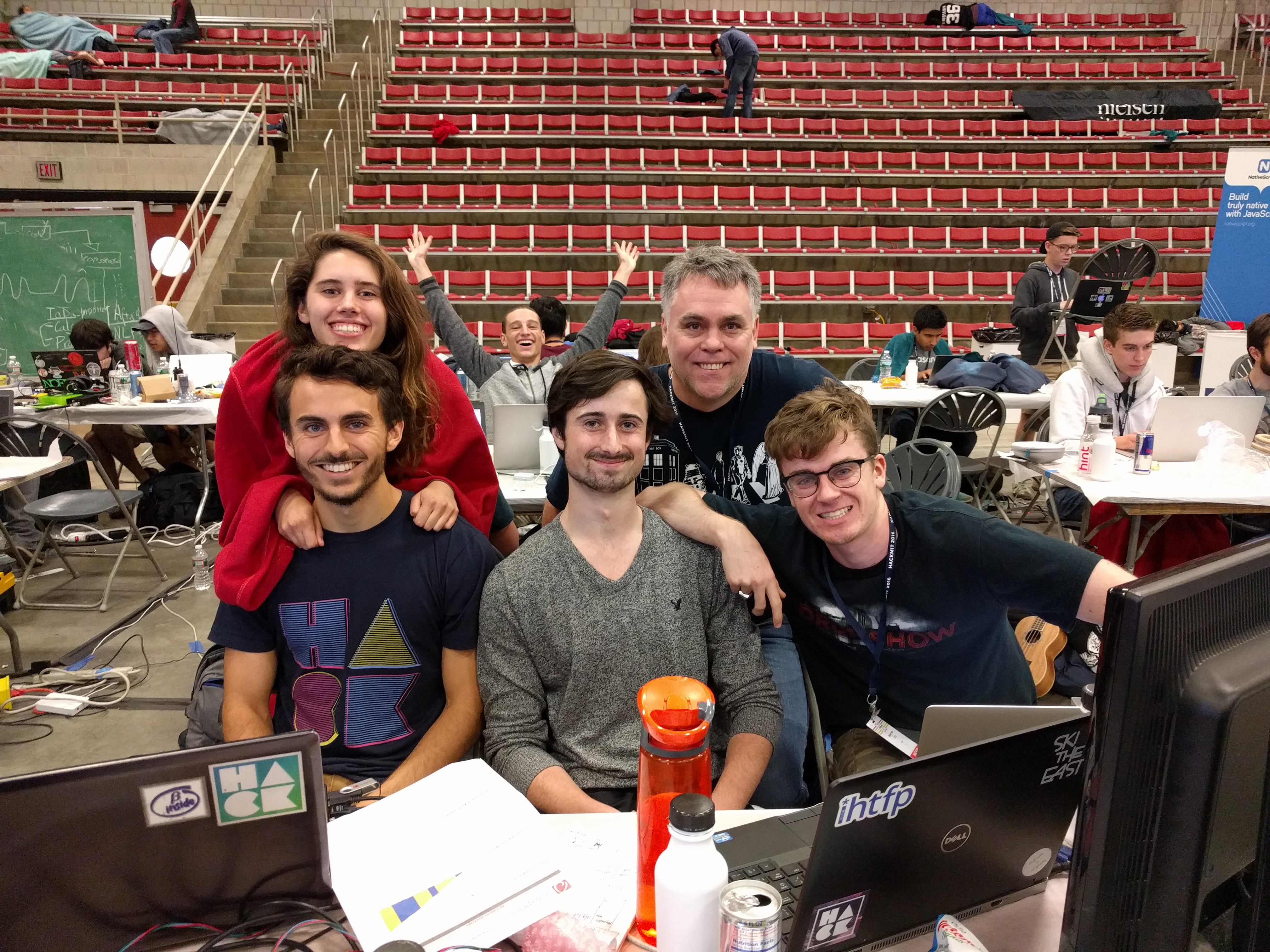 Team Ubuntu shows off their project to Charles Profitt before the project deadline for HackMIT 2016