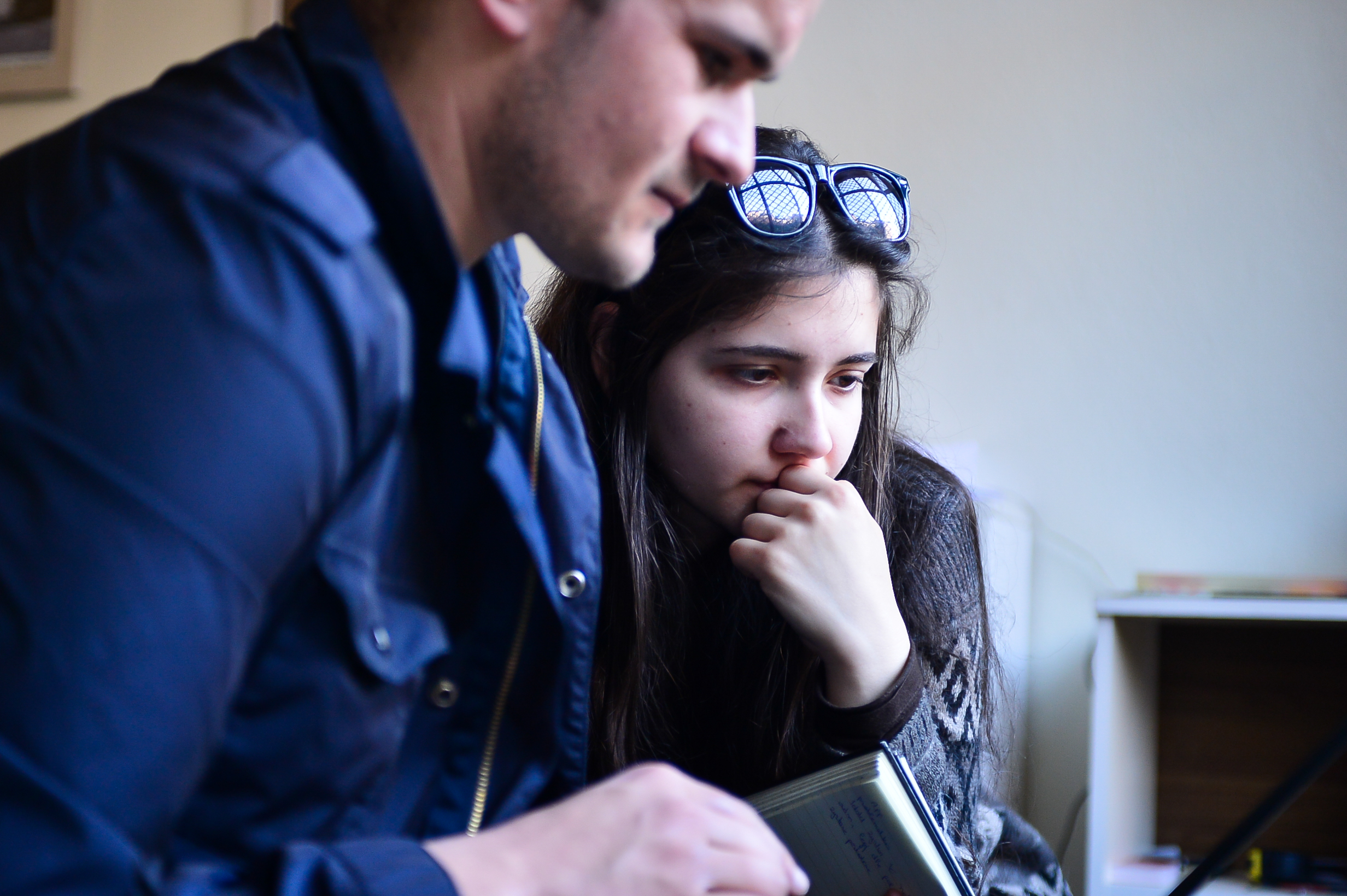 Two attendees work together on their project idea